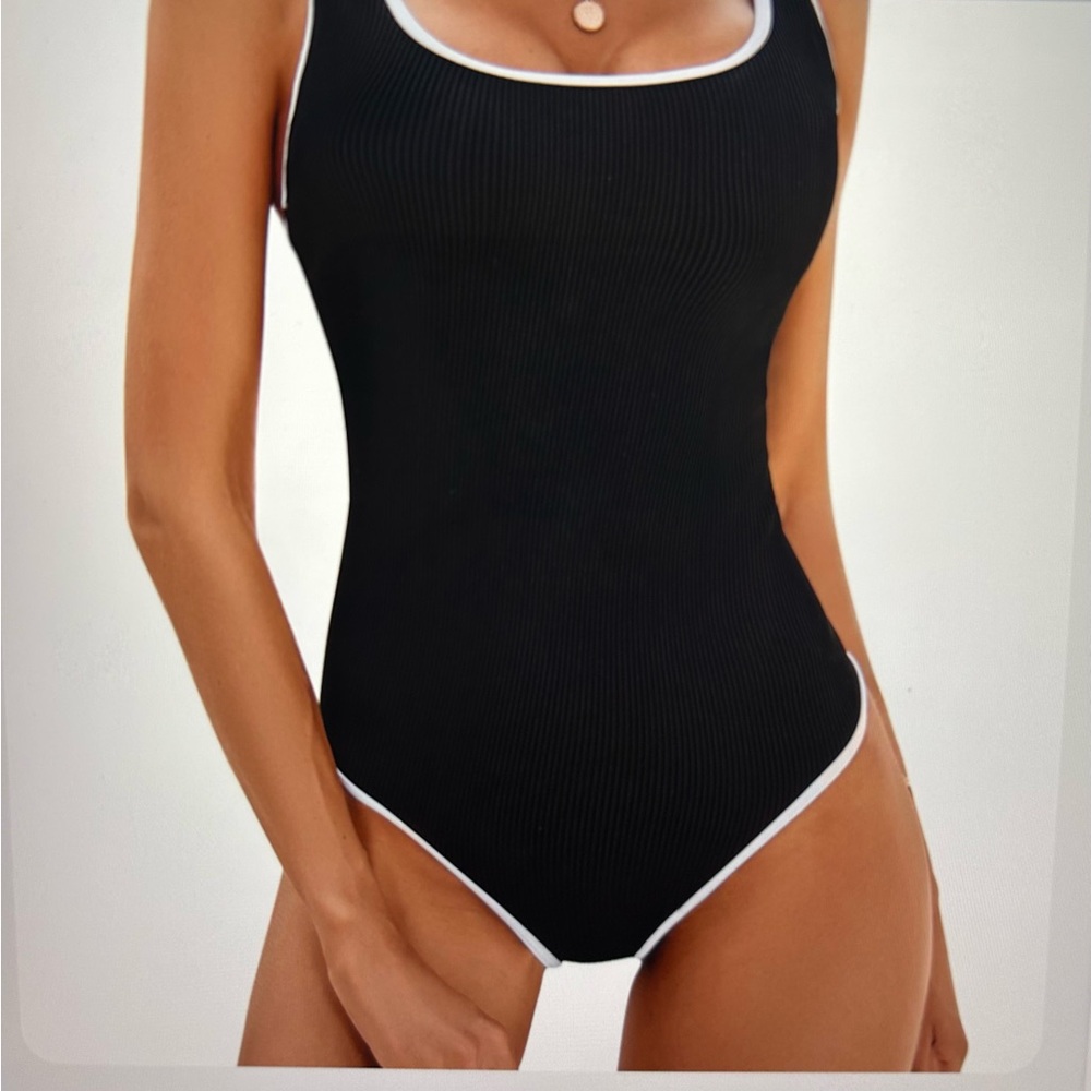 Black and White One-Piece Swimsuit with High-Cut Design